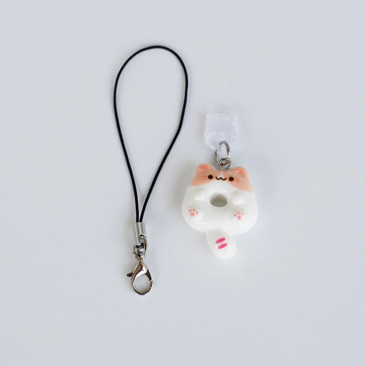 Stofdichte plug-hanger voor mo - Tablet Cute Accessories recensie en prijs